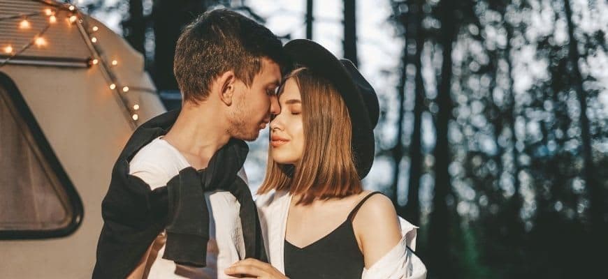 Young Couple Hugging in the Forest