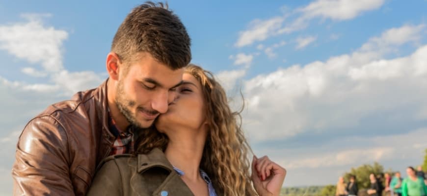 Young attractive happy couple having romantic time outdoor